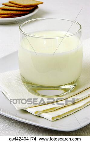 Close-up of a glass of milk View Large Photo Image Picture - Close-up of a glass of milk. Fotosearch