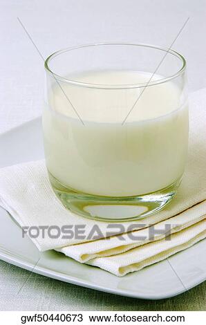 Close-up of a glass of milk View Large Photo Image Stock Image - Close-up of a glass of milk. Fotosearch