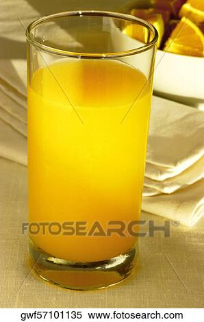 Close-up of a glass of orange juice View Large Photo Image Stock Photography - Close-up of a glass of orange juice. Fotosearch