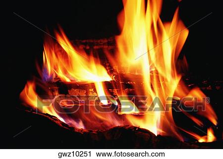 Close-up of a log fire View Large Photo Image Stock Image - Close-up of a log fire. Fotosearch
