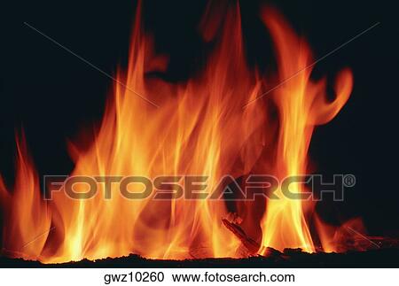 Close-up of a log fire View Large Photo Image Stock Image - Close-up of a log fire. Fotosearch