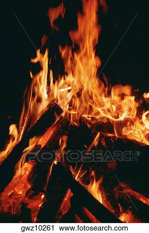 Close-up of a log fire View Large Photo Image Stock Image - Close-up of a log fire. Fotosearch