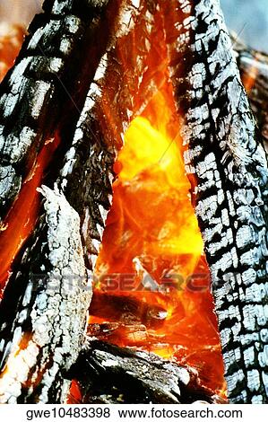 Close-up of a log fire View Large Photo Image Stock Photo - Close-up of a log fire. Fotosearch