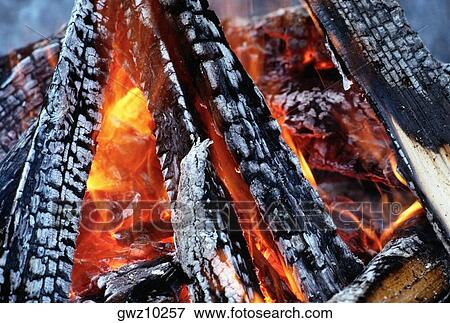 Close-up of a log fire View Large Photo Image Stock Photo - Close-up of a log fire. Fotosearch