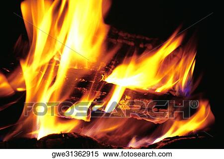 Close-up of a log fire View Large Photo Image Stock Photography - Close-up of a log fire. Fotosearch