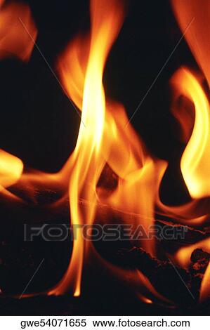Close-up of a log fire View Large Photo Image Stock Photography - Close-up of a log fire. Fotosearch