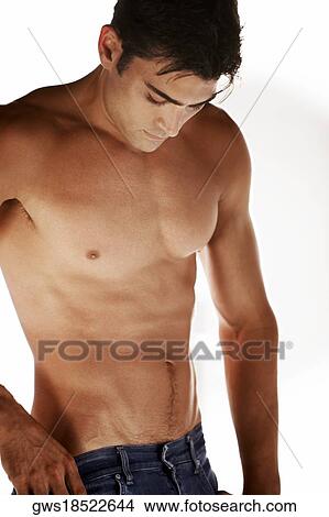 Close-up of a mid adult man looking serious View Large Photo Image Picture - Close-up of a mid adult man looking serious. Fotosearch