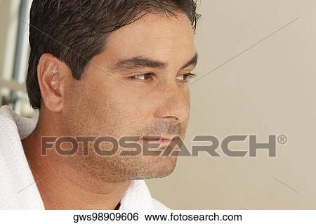 Close-up of a mid adult man View Large Photo Image Stock Photograph - Close-up of a mid adult man. Fotosearch