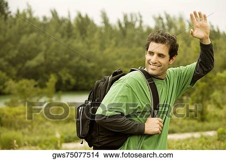 Close-up of a mid adult man waving his hand View Large Photo Image Picture - Close-up of a mid adult man waving his hand. Fotosearch