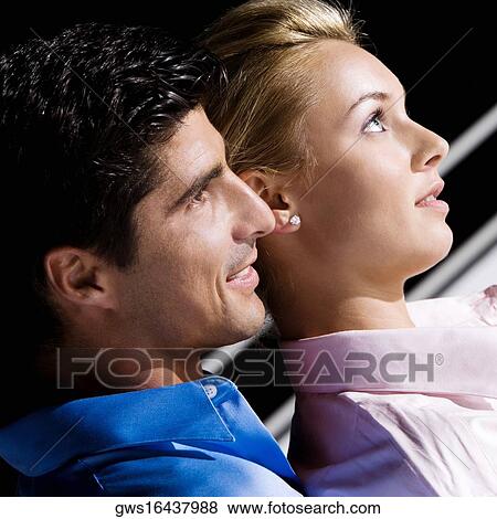 Close-up of a mid adult man with a young woman View Large Photo Image Stock Photo - Close-up of a mid adult man with a young woman. Fotosearch