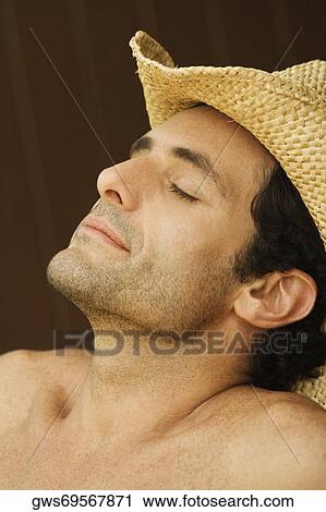 Close-up of a mid adult man with his eyes closed View Large Photo Image Stock Image - Close-up of a mid adult man with his eyes closed. Fotosearch