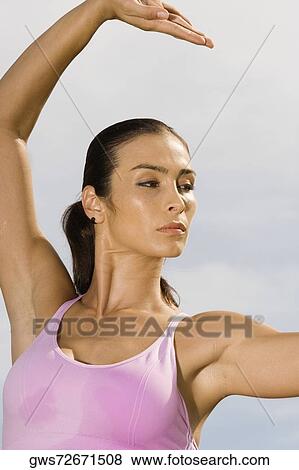 Close-up of a mid adult woman exercising View Large Photo Image Stock Photo - Close-up of a mid adult woman exercising. Fotosearch