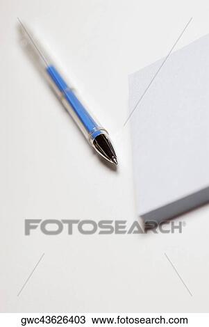 Close-up of a pen with a notepad View Large Photo Image Stock Image - Close-up of a pen with a notepad. Fotosearch