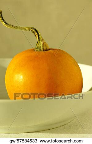 Close-up of a pumpkin in a bowl View Large Photo Image Stock Image - Close-up of a pumpkin in a bowl. Fotosearch