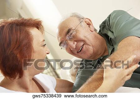 Stock Photo - Close-up of a senior couple looking at each other. Fotosearch