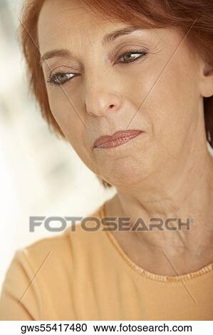 Close-up of a senior woman smiling View Large Photo Image Stock Image - Close-up of a senior woman smiling. Fotosearch