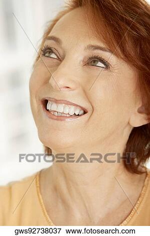 Stock Photo - Close-up of a senior woman smiling. Fotosearch