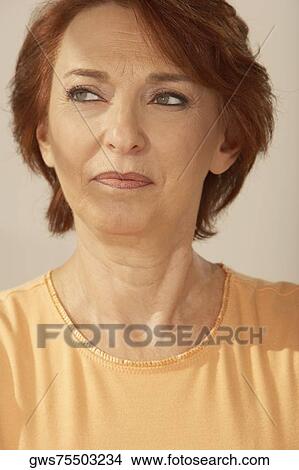 Picture - Close-up of a senior woman thinking. Fotosearch