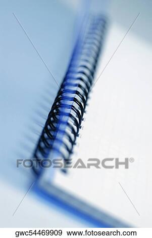 Close-up of a spiral notebook View Large Photo Image Stock Photo - Close-up of a spiral notebook. Fotosearch