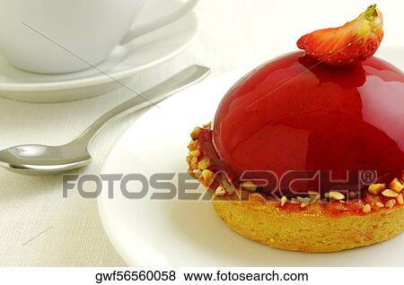 Close-up of a strawberry tart in a plate View Large Photo Image Stock Photo - Close-up of a strawberry tart in a plate. Fotosearch