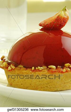 Close-up of a strawberry tart in a plate View Large Photo Image Stock Photograph - Close-up of a strawberry tart in a plate. Fotosearch
