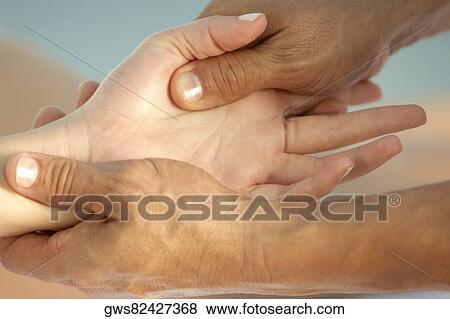 Close-up of a woman getting a hand massage View Large Photo Image Stock Photo - Close-up of a woman getting a hand massage. Fotosearch