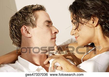 Stock Photograph - Close-up of a young couple. Fotosearch