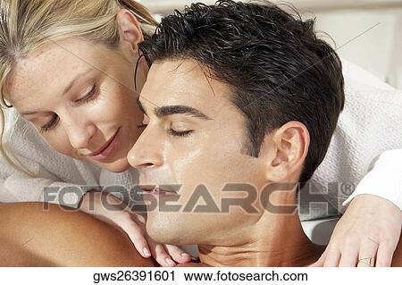 Close-up of a young man getting a massage from a massage therapist View Large Photo Image Stock Image - Close-up of a young man getting a massage from a massage therapist. Fotosearch