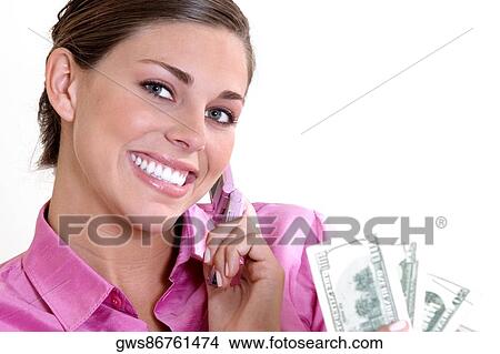 Close-up of a young woman smiling View Large Photo Image Picture - Close-up of a young woman smiling. Fotosearch