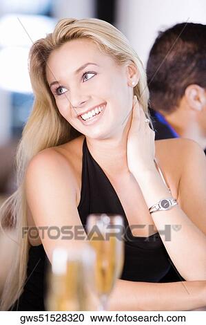 Stock Image - Close-up of a young woman smiling. Fotosearch