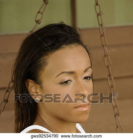 Close-up of a young woman View Large Photo Image Stock Image - Close-up of a young woman. Fotosearch