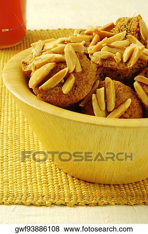 Close-up of almond muffins in a bowl View Large Photo Image Stock Photo - Close-up of almond muffins in a bowl. Fotosearch
