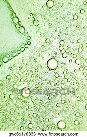 Stock Image - Close-up of bubbles in water. Fotosearch