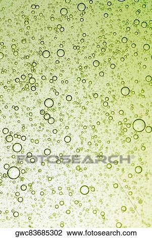Stock Image - Close-up of bubbles in water. Fotosearch