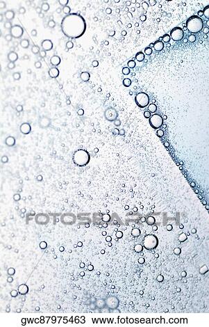 Stock Image - Close-up of bubbles in water. Fotosearch