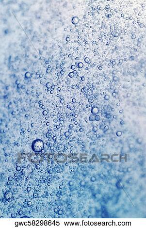 Close-up of bubbles in water View Large Photo Image Stock Photography - Close-up of bubbles in water. Fotosearch