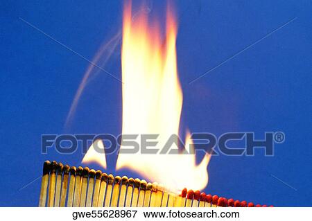 Stock Photo - Close-up of burning matchsticks. Fotosearch