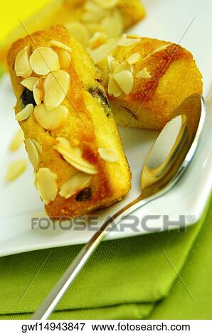 Close-up of cakes in a plate View Large Photo Image Stock Photo - Close-up of cakes in a plate. Fotosearch