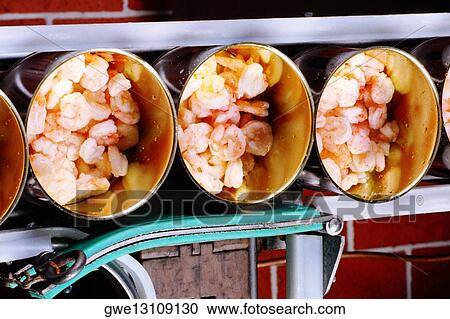 Close-up of canned food on a conveyor belt, Maryland, USA View Large Photo Image Stock Image - Close-up of canned food on a conveyor belt, Maryland, USA. Fotosearch