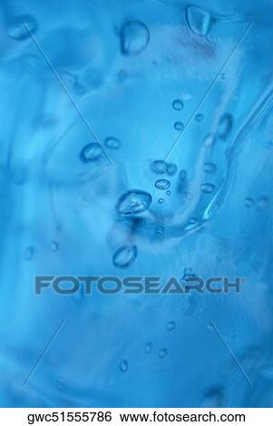 Close-up of liquid View Large Photo Image Stock Photograph - Close-up of liquid. Fotosearch