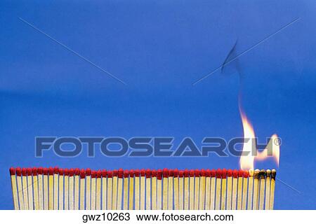 Stock Image - Close-up of matchsticks burning. Fotosearch