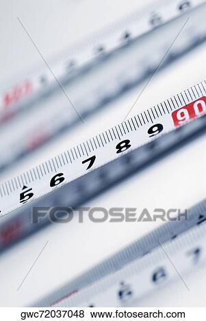 Close-up of measuring tapes View Large Photo Image Stock Photo - Close-up of measuring tapes. Fotosearch