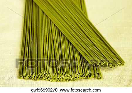 Stock Image - Close-up of raw spaghetti. Fotosearch