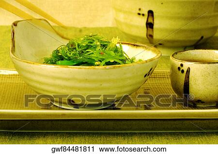 Close-up of salad in a bowl View Large Photo Image Stock Image - Close-up of salad in a bowl. Fotosearch