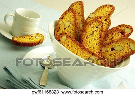 Close-up of slices of almond cake in a bowl View Large Photo Image Stock Image - Close-up of slices of almond cake in a bowl. Fotosearch
