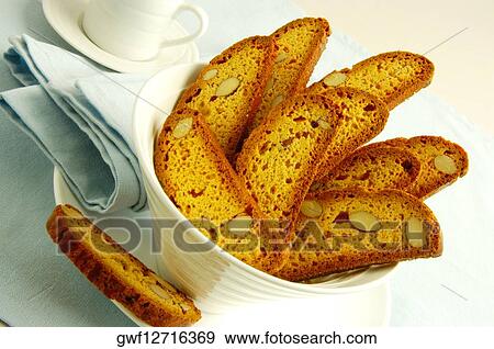 Close-up of slices of almond cake in a bowl View Large Photo Image Stock Photo - Close-up of slices of almond cake in a bowl. Fotosearch