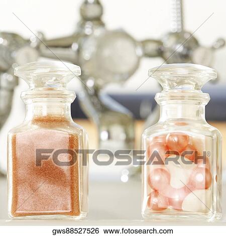 Close-up of soap powder and bath pearls in glass bottles View Large Photo Image Stock Photograph - Close-up of soap powder and bath pearls in glass bottles. Fotosearch