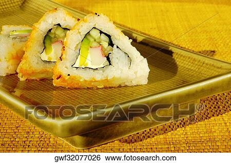 Close-up of sushi on a serving tray View Large Photo Image Stock Photograph - Close-up of sushi on a serving tray. Fotosearch
