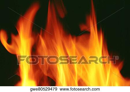 Close-up of the flames of a log fire View Large Photo Image Stock Photo - Close-up of the flames of a log fire. Fotosearch