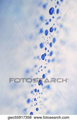Stock Photo - Close-up of water drops on a surface. Fotosearch
